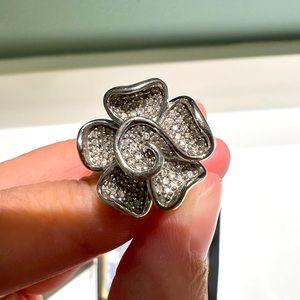 Real diamond statement ring in flower setting